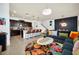 Open floor plan boasting a modern kitchen with island and spacious living area at 8891 Geneve Ct, Kissimmee, FL 34747