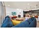 Bright and airy living room with a comfortable sectional sofa and open concept layout at 8891 Geneve Ct, Kissimmee, FL 34747