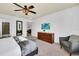 King-size bed in a spacious Primary bedroom at 8891 Geneve Ct, Kissimmee, FL 34747