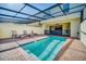 Enjoy this private screened pool and patio, perfect for relaxing at 8891 Geneve Ct, Kissimmee, FL 34747