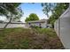 Fenced backyard with plenty of space for outdoor activities at 110 Oleander Ave, Auburndale, FL 33823