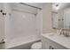 Clean bathroom with a white vanity and marble shower at 110 Oleander Ave, Auburndale, FL 33823
