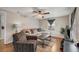 Comfortable living room featuring wood flooring at 110 Oleander Ave, Auburndale, FL 33823