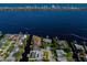 Aerial view showcasing home's waterfront location and neighborhood at 136 Reef Rd, South Daytona, FL 32119