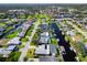 Aerial view of single Gathering home with private pool and canal access at 136 Reef Rd, South Daytona, FL 32119
