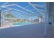 Inviting screened pool area with ample patio space at 136 Reef Rd, South Daytona, FL 32119
