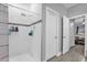 Bathroom with a walk-in shower and modern fixtures at 1917 Michigan Drive, Poinciana, FL 34759
