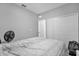 Spacious bedroom with a queen bed and a large closet at 1917 Michigan Drive, Poinciana, FL 34759
