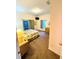 Guest bedroom with two twin-size beds and a dresser at 210 Watling Way # 24-210, Davenport, FL 33897