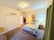 Bedroom with a full-size bed, dresser, and closet at 210 Watling Way # 24-210, Davenport, FL 33897