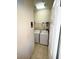Convenient laundry room with washer and dryer at 210 Watling Way # 24-210, Davenport, FL 33897