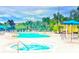 Resort-style pool and spa with ample lounge space at 210 Watling Way # 24-210, Davenport, FL 33897