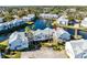 Aerial view of waterfront property showing building location and surrounding community at 2516 Woodgate Blvd # 206, Orlando, FL 32822