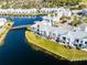 Aerial view of the property showing its waterfront location at 2516 Woodgate Blvd # 206, Orlando, FL 32822