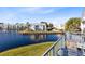 Balcony overlooking a peaceful lake with lush green landscaping at 2516 Woodgate Blvd # 206, Orlando, FL 32822