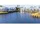 Community features a waterfront view with a fountain in the middle of the lake at 2516 Woodgate Blvd # 206, Orlando, FL 32822