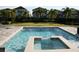 Relaxing pool and spa area with ample lounge chairs at 289 Auburn Ave, Kissimmee, FL 34747