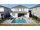 Home with private pool, spa, patio furniture, and fenced backyard at 289 Auburn Ave, Kissimmee, FL 34747