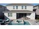 Home with private pool, spa, patio furniture, and fenced backyard at 289 Auburn Ave, Kissimmee, FL 34747