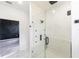 Bathroom with a large walk-in shower and marble tile at 326 Spinnaker Ct, Auburndale, FL 33823