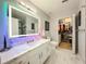 Bathroom boasts a large vanity, walk-in shower, and a sizable closet at 3383 Westchester Square Blvd # 202, Orlando, FL 32835