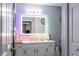 Modern bathroom with LED mirror and updated vanity at 3383 Westchester Square Blvd # 202, Orlando, FL 32835