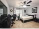 Spacious bedroom with large window, ceiling fan and room for a workspace at 3383 Westchester Square Blvd # 202, Orlando, FL 32835