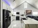 Modern white kitchen with quartz countertops and stainless steel appliances at 3383 Westchester Square Blvd # 202, Orlando, FL 32835