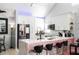 Modern white kitchen with quartz countertops and stainless steel appliances at 3383 Westchester Square Blvd # 202, Orlando, FL 32835