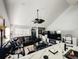 Open concept living room with sectional sofa and large TV at 3383 Westchester Square Blvd # 202, Orlando, FL 32835