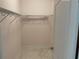 Spacious walk-in closet with wire shelving at 17353 Chateau Pine Way, Clermont, FL 34711