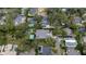 House nestled in a neighborhood with other homes and pools at 2161 Sharon Rd, Winter Park, FL 32789