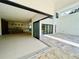 Open floor plan connecting the patio and kitchen at 2161 Sharon Rd, Winter Park, FL 32789