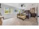 Main bedroom with plush carpeting and a four-poster bed at 2351 Westwood Dr, Longwood, FL 32779