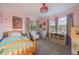 Charming bedroom with twin bed and colorful decor at 2351 Westwood Dr, Longwood, FL 32779