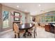 Charming dining room with a wooden table and zebra patterned chairs at 2351 Westwood Dr, Longwood, FL 32779