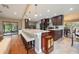 Bright kitchen features granite counters, stainless steel appliances & breakfast bar at 2351 Westwood Dr, Longwood, FL 32779