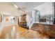 Spacious living room with hardwood floors and brick accent wall at 2351 Westwood Dr, Longwood, FL 32779