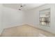 Well-lit bedroom featuring tile floors and a ceiling fan at 2816 Oak Shore Rd, Oviedo, FL 32766