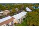 Aerial view of community featuring lake and building at 3954 Versailles Dr # 3954B, Orlando, FL 32808