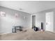 Large carpeted bedroom with neutral walls and plenty of space at 3954 Versailles Dr # 3954B, Orlando, FL 32808