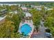 Community pool and surrounding buildings at 4121 Versailles Dr # 4121H, Orlando, FL 32808