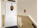 Condo entry with white door and autumn decor at 4121 Dijon Dr # 4121H, Orlando, FL 32808