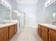 Large bathroom with double sinks, shower and tub at 425 Tree Shore Dr, Orlando, FL 32825