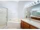 Bathroom features double vanity and corner shower at 425 Tree Shore Dr, Orlando, FL 32825