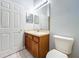 Bathroom with toilet, vanity, and single sink at 425 Tree Shore Dr, Orlando, FL 32825