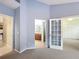 Bright bedroom with access to bathroom and other rooms at 425 Tree Shore Dr, Orlando, FL 32825