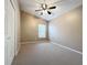 Spacious bedroom with ceiling fan and carpeting at 425 Tree Shore Dr, Orlando, FL 32825