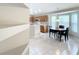 View of kitchen with breakfast nook and built-in shelving at 425 Tree Shore Dr, Orlando, FL 32825