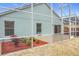 Screened-in patio area with view of fenced backyard at 425 Tree Shore Dr, Orlando, FL 32825